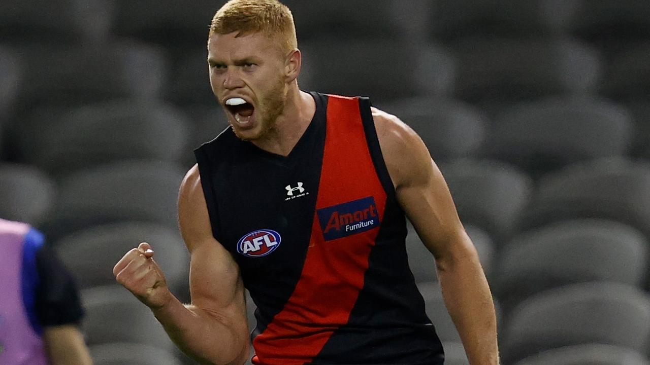 MELBOURNE, AUSTRALIA - AUGUST 08: Peter Wright of the Bombers celebrates a goal during the 2021 AFL Round 21 match between the Western Bulldogs and the Essendon Bombers at Marvel Stadium on August 8, 2021 in Melbourne, Australia. (Photo by Michael Willson/AFL Photos via Getty Images)