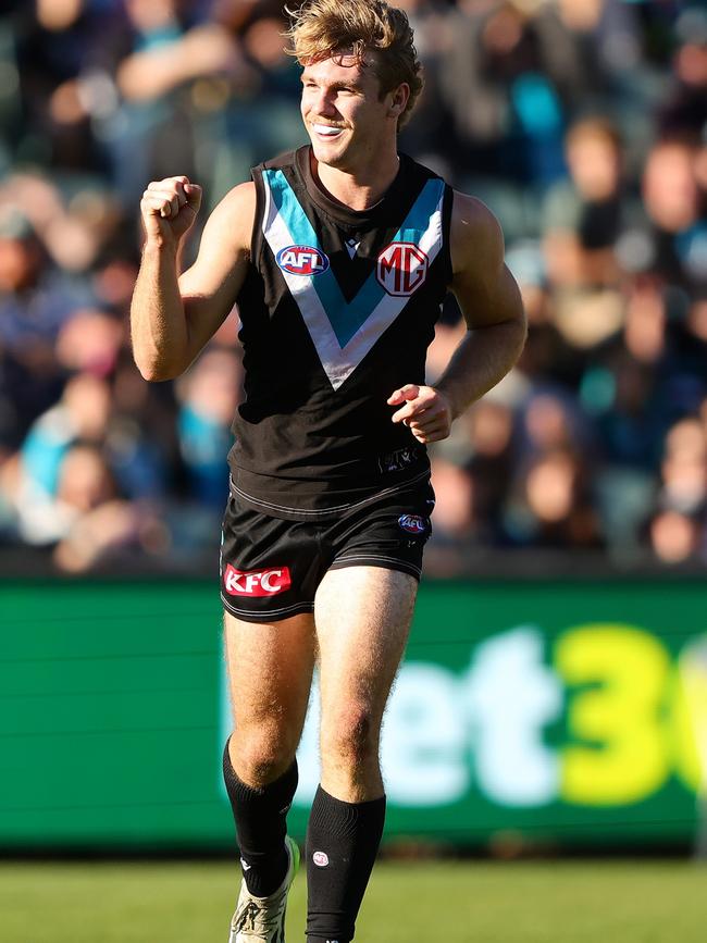 Jason Horne-Francis celebrates kicking one of his three goals for Port Adelaide against the Bulldogs at Adelaide Oval on Saturday. Picture: Sarah Reed/AFL Photos via Getty Images