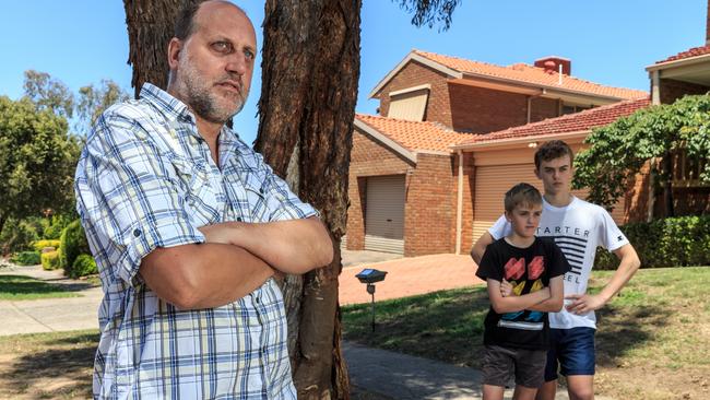 Alan Sturmar — pictured with his sons — says speeding is out of control in his street.