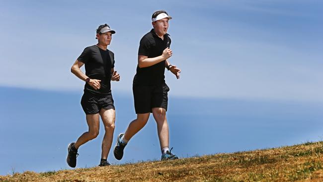 Ross Kingsley training his 13 year old son, Hudson Kingsley, at Pizzey Park. Picture Glenn Hampson