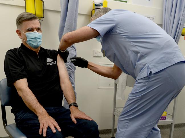 Chief Medical Officer Brendan Murphy gets his AstraZeneca vaccine. Picture: Andrew Henshaw