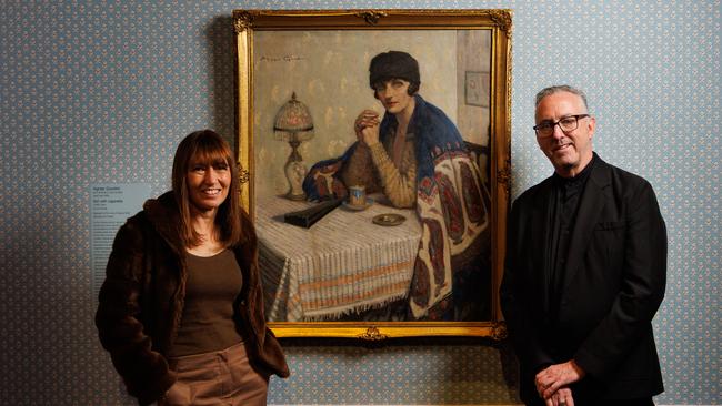 AGNSW director Maud Page and AGSA director Jason Smith with a 1925 artwork by Australian painter Agnes Goodsir. Picture: Matt Turner