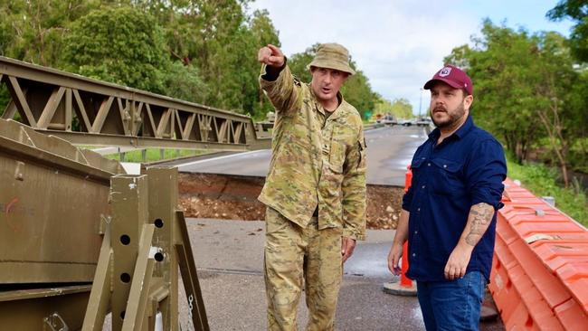 Herbert MP Phillip Thompson with soldiers from Townsville's 3rd Brigade of the Australian Army working hard to repair the Bruce Highway, including the Ollera Creek Bridge north of Townsville.