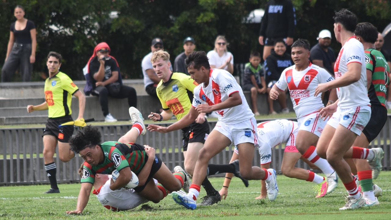 Jahzelle Lokeni is tackled by Jack Lambert. Picture: Sean Teuma