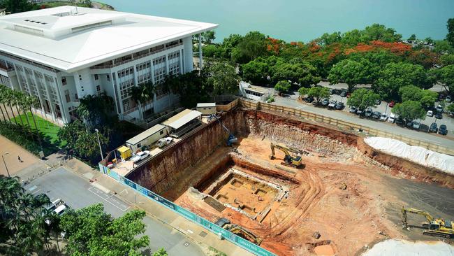 Concrete is being poured for the foundation of the new underground car park beside Parliament House in Darwin on Thursday morning. Picture: JUSTIN KENNEDY