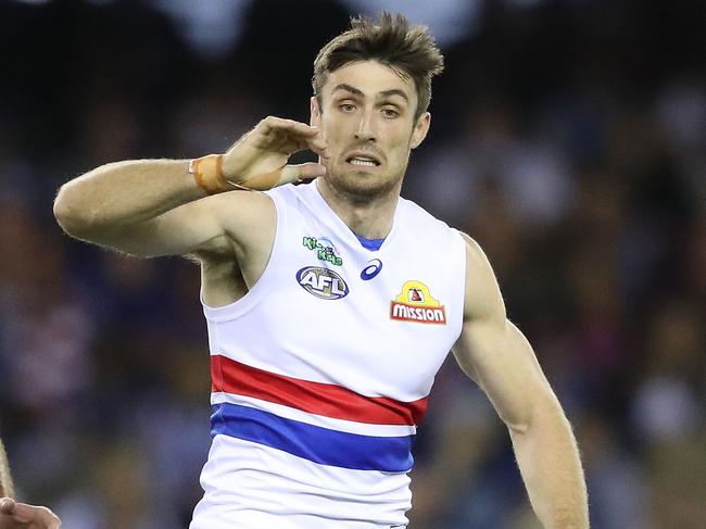 MELBOURNE, AUSTRALIA - APRIL 14:  Todd Goldstein of the Kangaroos and Tom Campbell of the Bulldogs compete for the ball during the round four AFL match between the North Melbourne Kangaroos and the Western Bulldogs at Etihad Stadium on April 14, 2017 in Melbourne, Australia.  (Photo by Scott Barbour/Getty Images)