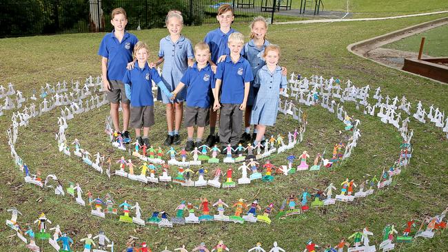 Students with some of their artworks. Picture: Troy Snook