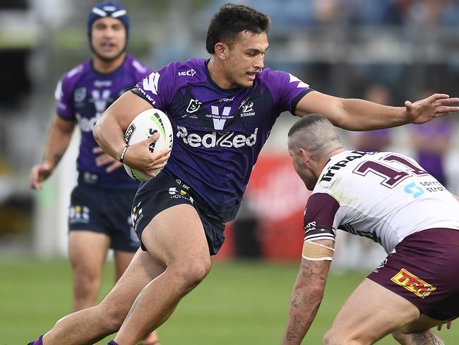 SUNSHINE COAST, AUSTRALIA - AUGUST 30: Tino Faasuamaleaui of the Storm runs the ball during the round 16 NRL match between the Melbourne Storm and the Manly Sea Eagles at Sunshine Coast Stadium on August 30, 2020 in Sunshine Coast, Australia. (Photo by Ian Hitchcock/Getty Images)