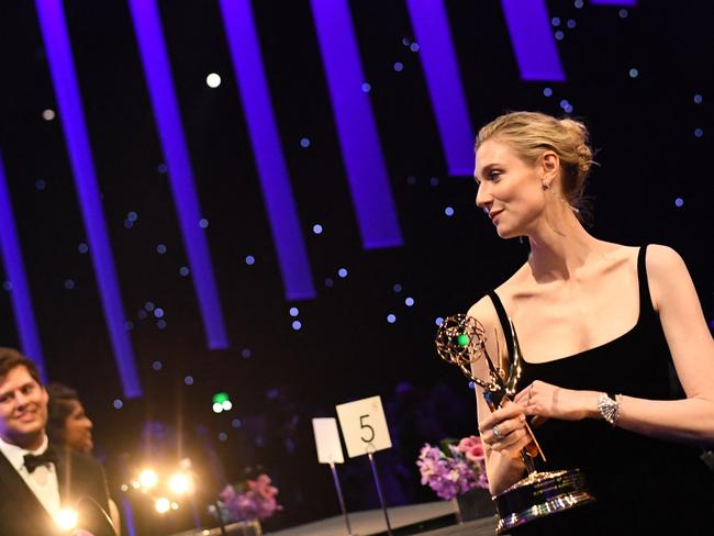 Australian actress Elizabeth Debicki poses with her Emmy at the Governors Gala. Picture: AFP