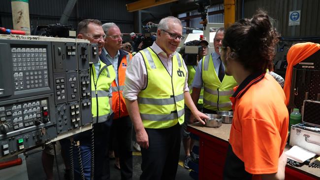 Scott Morrison visits a hydraulics company in Devonport, Tasmania, on Tuesday. Picture: Adam Taylor