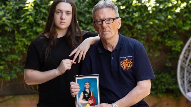 PLEASE CONTACT NETWORK PICTURE DESK BEFORE PUBLISHING.     Wayne Holdsworth and daughter Daisy, 15, at home in Melbourne. Wayne is behind a campaign for a social media blackout with the organisation called SmackTalk for suicide prevention after loosing his son Mac. Picture: Jason Edwards