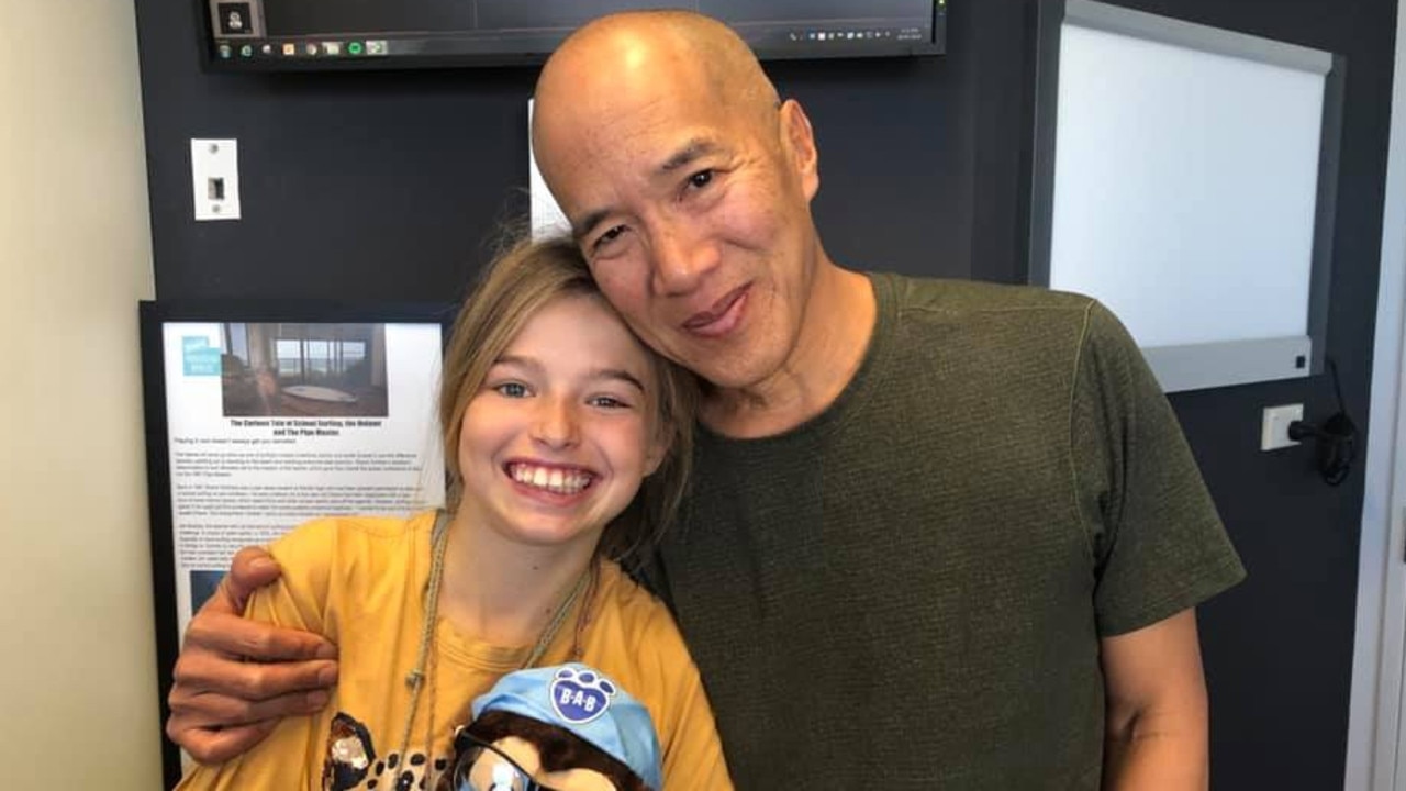 Milli Lucas, pictured with neurosurgeon Charlie Teo, has died from cancer at the age of 14. Picture: Team Millstar/Facebook