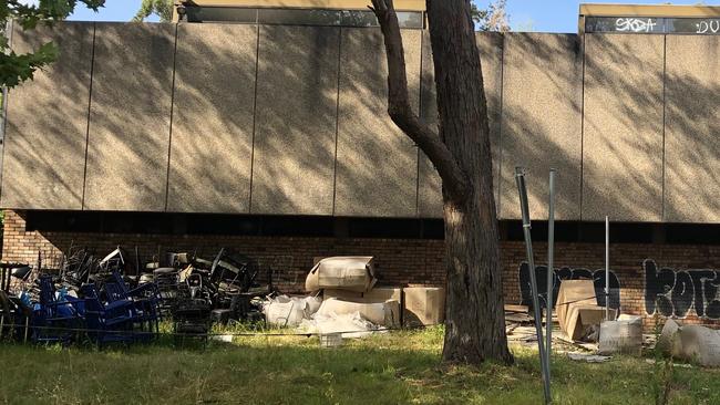 The horse have been left on the rubbish-strewn abandoned Belrose Library site. Picture: Jim O'Rourke