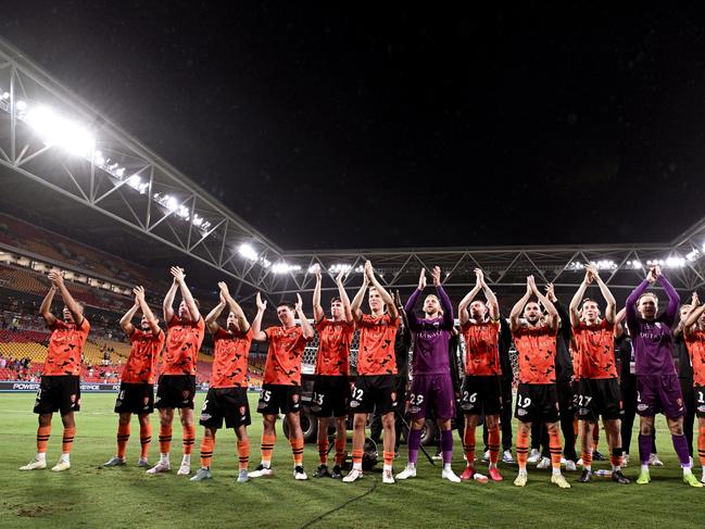 Roar players thank their fans after the win over Melbourne City. Picture: Bradley Kanaris/Getty Images