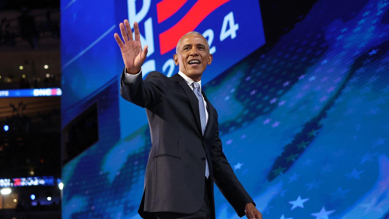 Former US President Barack Obama walks off stage after speaking on the second day of the Democratic National Convention. Picture: AFP.