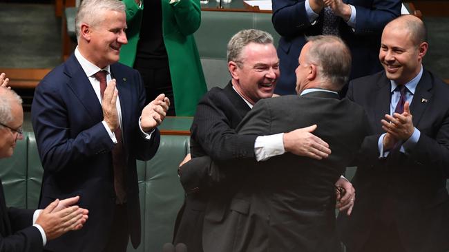 Shadow Minister for Infrastructure Anthony Albanese hugs Minister for Defence Christopher Pyne after his valedictory speech in the House of Representatives at Parliament House, in Canberra, April 4, 2019. Picture: Sam Mooy