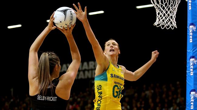 Australia’s Emily Mannix defends against New Zealand’s Te Paea Selby-Rickit during their Quad Series match in Invercargill.