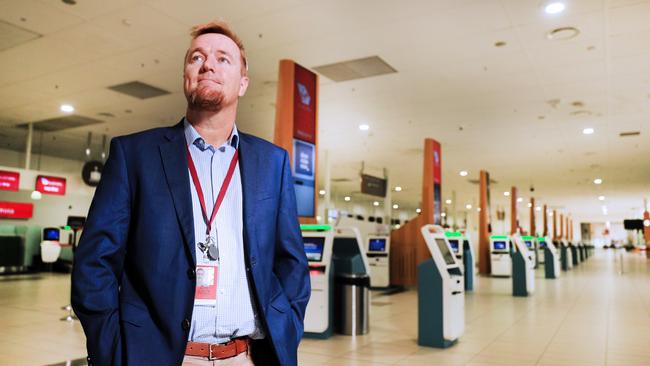 Queensland Aircorp Limited CEO Chris Mills in an empty Gold Coast Airport check in area. Photo Scott Powick Newscorp