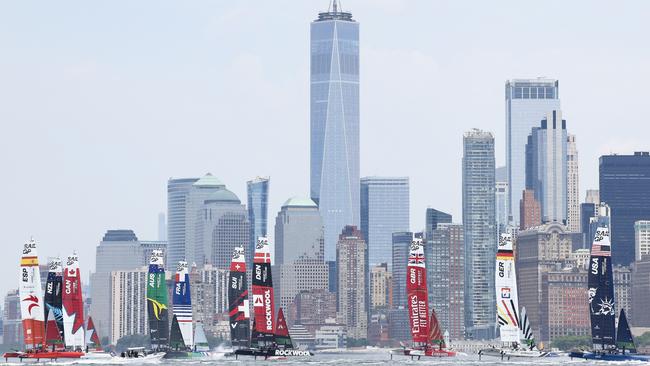 The SailGP fleets races in front of the New York City skyline. (Photo by Luke Hales/Getty Images)