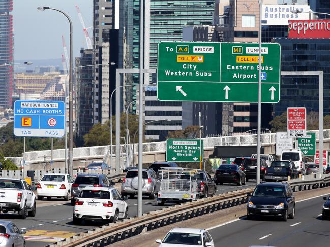 Motorist driving towards the Sydney Harbour Tunnel and Bridge toll at North Sydney. Picture: Jonathan Ng