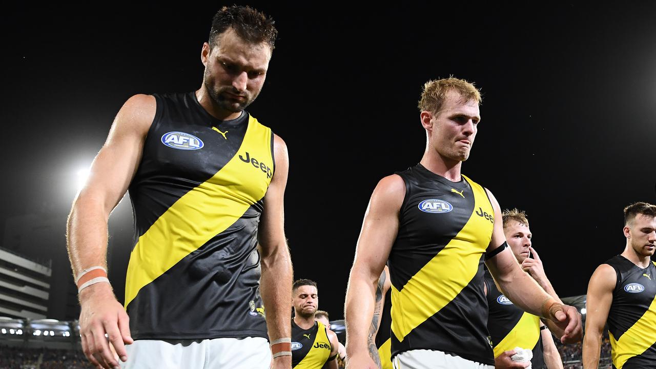 A dejected Toby Nankervis and David Astbury walk off the Gabba. Picture: Quinn Rooney/Getty Images