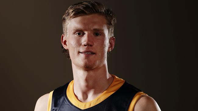 Fischer McAsey of the  Adelaide Crows poses for a photograph during the first round of the 2019 AFL Draft at Marvel Stadium in Melbourne, Wednesday, November 27, 2019. (AAP Image/Scott Barbour) NO ARCHIVING