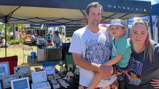 Tom Cornwell, Aiden Cornwell, 5, and Raquel Strange are excited about their new family project, My Little Market Stall, now selling gifts at the Airlie Beach Markets. Picture: Shannen McDonald