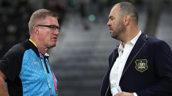 Fiji coach John McKee (left) has hit back at Wallaby coach Michael Cheika (right). Picture: Getty Images