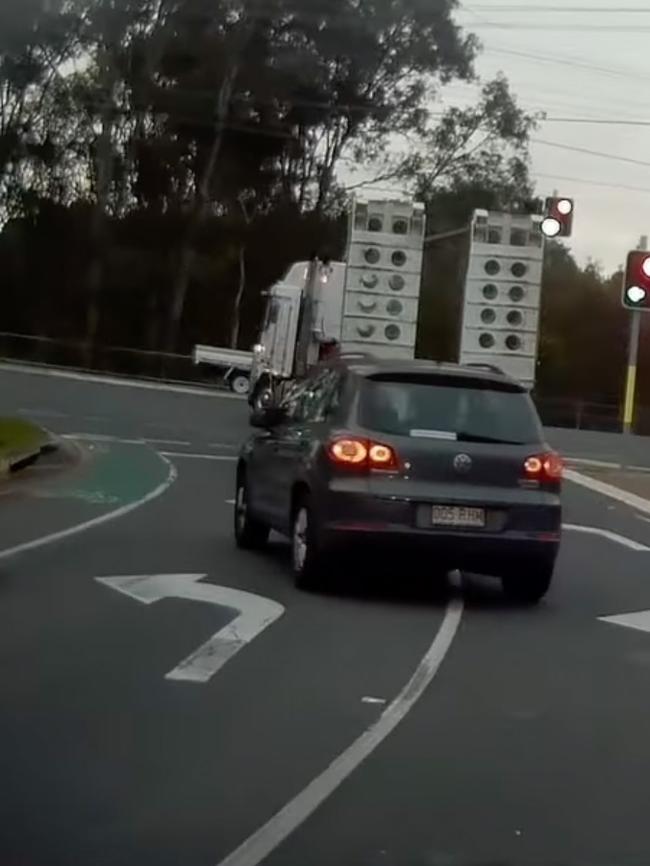 The SUV dangerously overtook the truck. Picture: Dash Cam Owners Australia