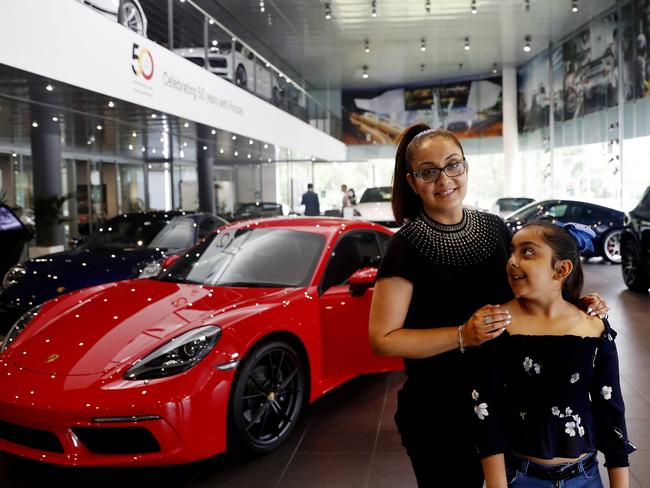 Porsche customer Niti Bajaj with daughter Sana at the Willoughby dealership in Sydney, Tuesday, 19 January, 2021. Picture: Nikki Short