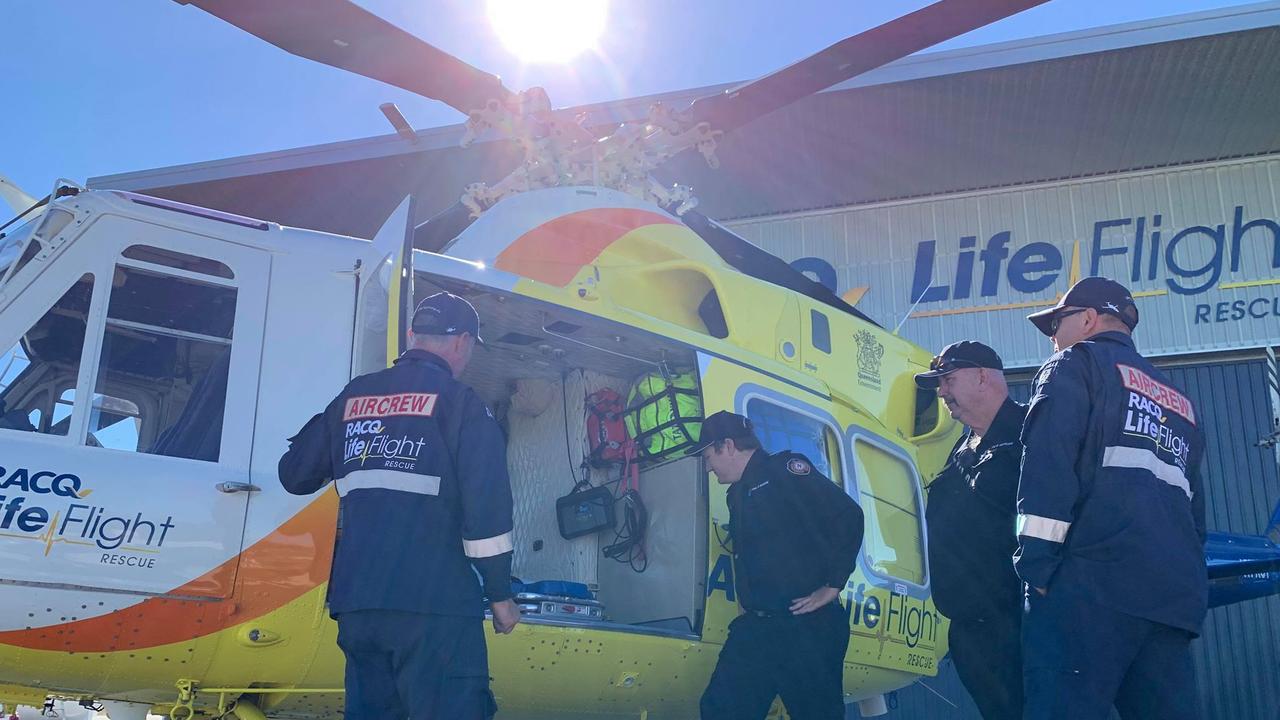 EMERGENCY CREWS ASSEMBLE: RACQ LifeFlight Rescue and emergency services join forces to launch Queensland Road Safety Week.