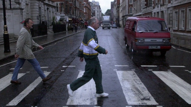 John Howard on his morning walk in London’s Mayfair in July 2000. Picture: Michael Jones