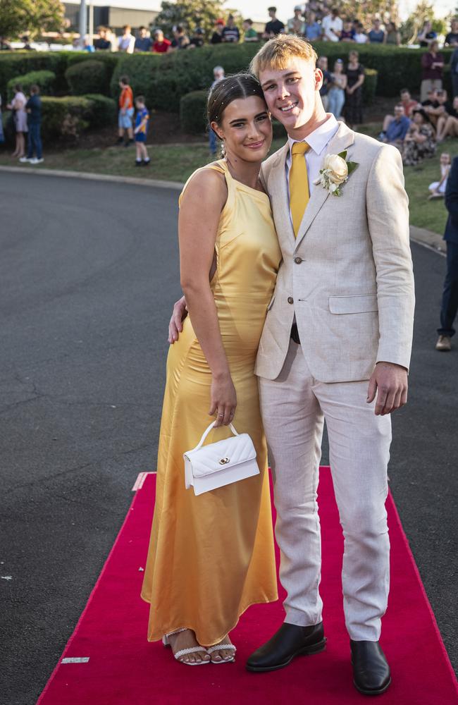 Graduates Dayna Bailey and Trent Fenton arrive at Mary MacKillop Catholic College formal at Highfields Cultural Centre, Thursday, November 14, 2024. Picture: Kevin Farmer