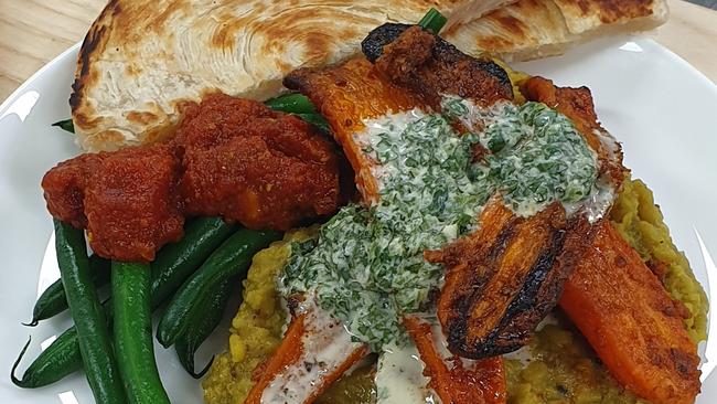 Qantas may soon offer artificial meat on its in-flight menu, along with plant-based meals such as tandoori roast carrots with spicy tomato and green bean kasundi.