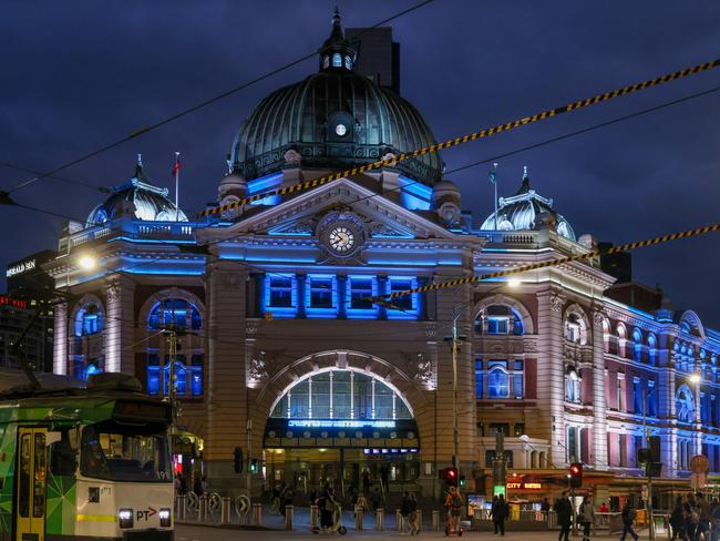 Flinders Street Station lit up in blue and white in solidarity with Israel on Monday night. Picture: Asanka Ratnayake