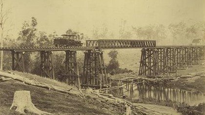 Locomotive on a Railway Bridge, Graham Creek, ca. 1882. Marking the expansion of Queensland’s railway network, connecting communities and industries. Source: Unknown