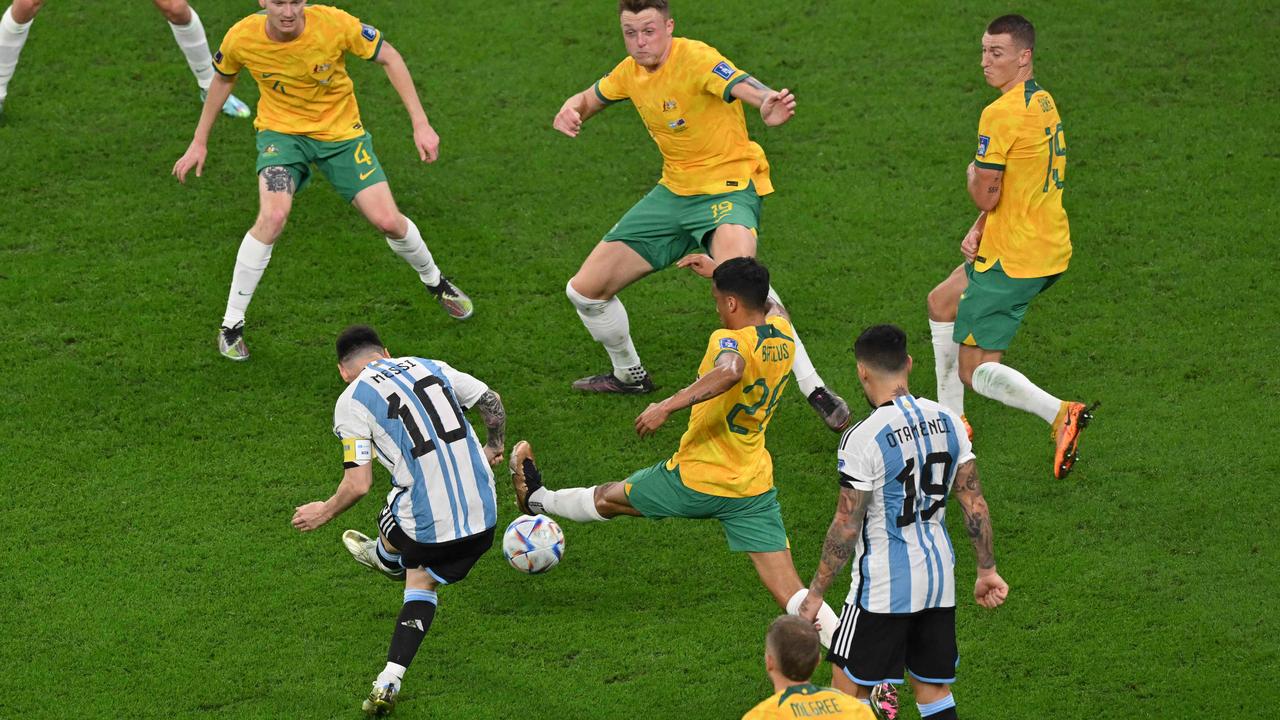 Argentina's forward #10 Lionel Messi scores his team's first goal