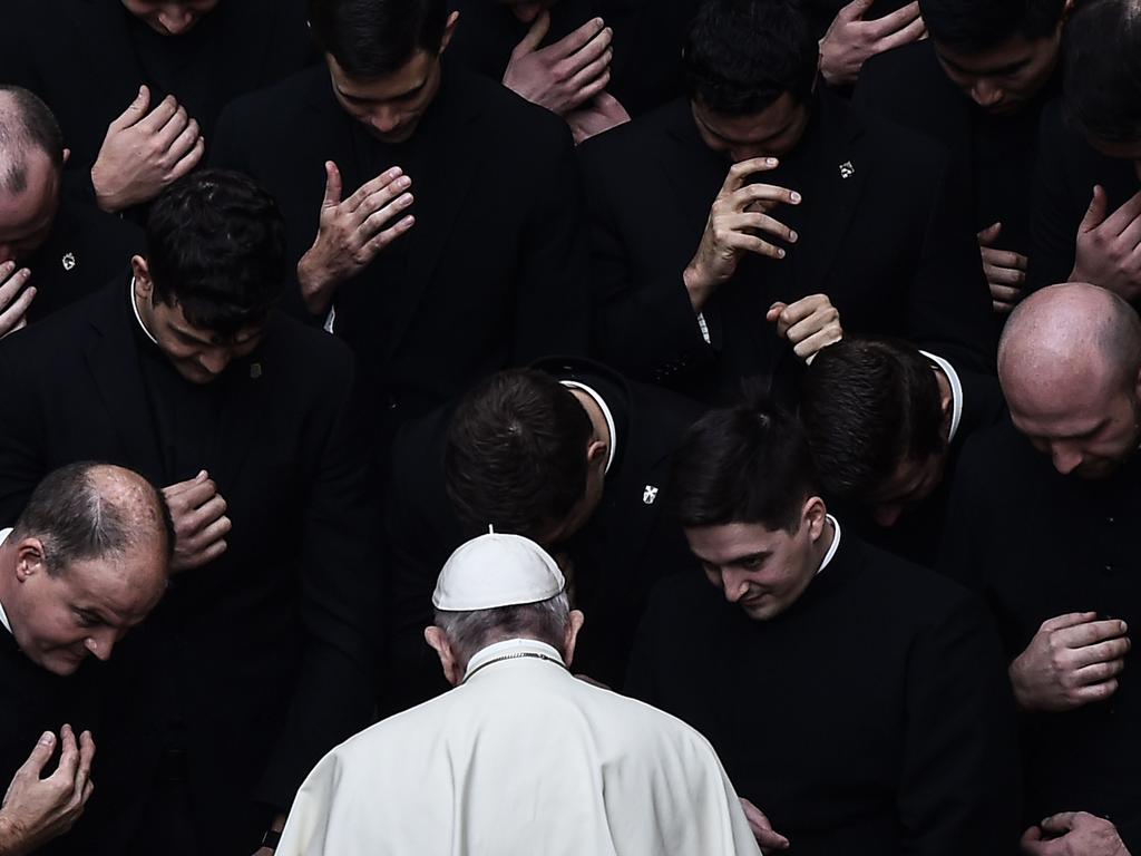 Pope Francis prays with priests at the end of a limited public audience at the San Damaso courtyard in The Vatican on September 30, 2020 during the Covid-19 outbreak. Picture: AFP