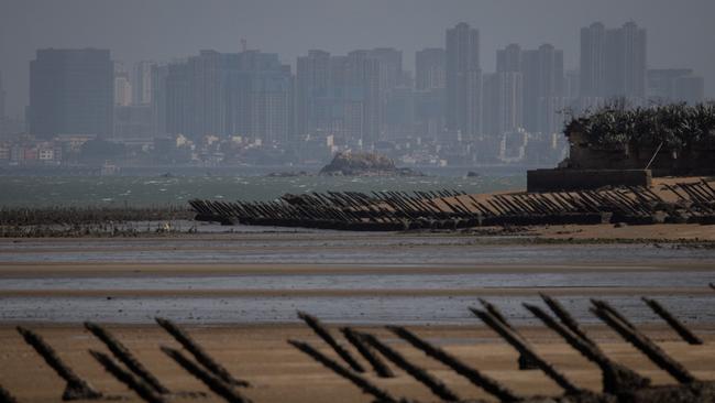 Anti-tank fortifications from previous conflicts line the beach in front of the Chinese city of Xiamen in Kinmen, Taiwan.