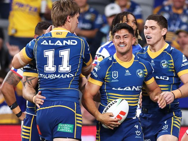 SYDNEY, AUSTRALIA - APRIL 28: Dylan Brown of the Eels celebrates with his team mates after scoring a try during the round nine NRL match between Parramatta Eels and Newcastle Knights at CommBank Stadium on April 28, 2023 in Sydney, Australia. (Photo by Mark Kolbe/Getty Images)