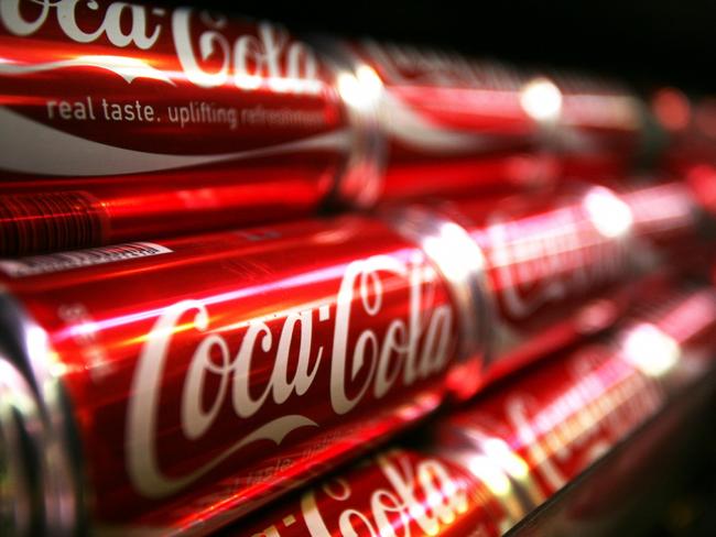 20/11/2008 BUSINESS: Rows of Coca-Cola soft drink line a supermarket shelf in Sydney, Australia, on Monday, Nov. 17, 2008. Lion Nathan Ltd., Australia's second-largest brewer, offered to buy Coca-Cola Amatil Ltd. for A$7.6 billion ($4.9 billion) in cash and stock to create the nation's biggest beverages group. Photographer: Ian Waldie/Bloomberg News