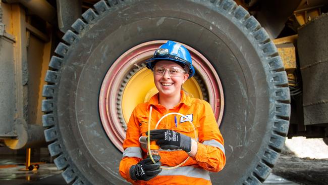 Apprentice Rhianna Whouley works on a truck at BHP’s Blackwater coalmine in Queensland. Picture: Daryl Wright