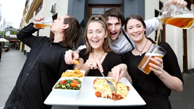 The Imperial Hotel's parma has many fans, including employees Sam Dillon, Natasha Alessi, Nick Buckland and Rebecca Rixon. Picture: Nicole Cleary