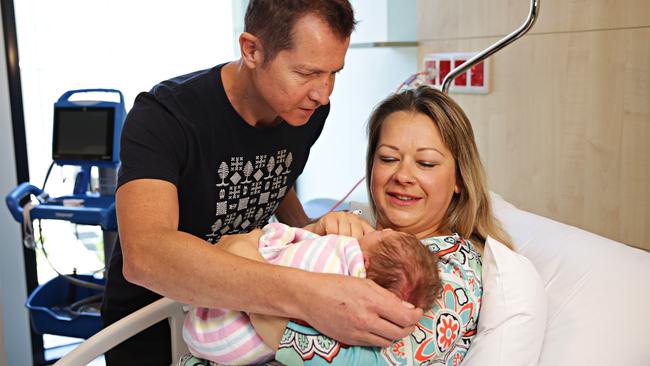 Ryan and Janan Waage with new baby Adam who are the first patients transferred to the new Northern Beaches Hospital which opened today. Picture: Adam Yip / Manly Daily