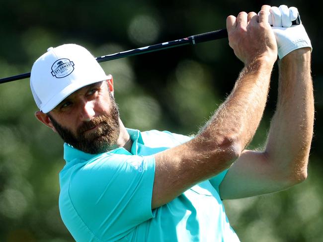 AUGUSTA, GEORGIA - APRIL 04: Dustin Johnson of the United States plays a shot during a practice round prior to the Masters at Augusta National Golf Club on April 04, 2022 in Augusta, Georgia.   Andrew Redington/Getty Images/AFP == FOR NEWSPAPERS, INTERNET, TELCOS & TELEVISION USE ONLY ==