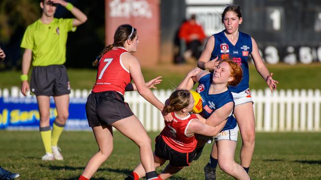 Harriet Knijff tackles for the Sharks.