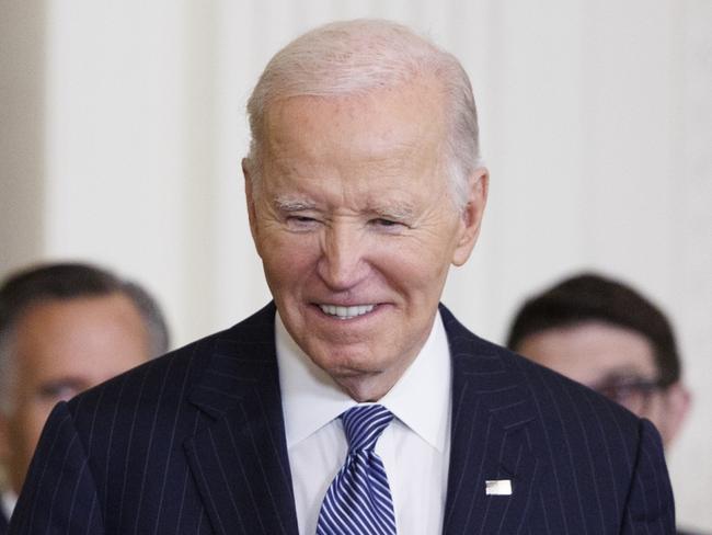 WASHINGTON, DC - JANUARY 4: Fashion designer Ralph Lauren greets U.S. President Joe Biden before being awarded the Presidential Medal of Freedom in the East Room of the White House on January 4, 2025 in Washington, DC. President Biden is awarding 19 recipients with the nation's highest civilian honor. (Photo by Tom Brenner/Getty Images)