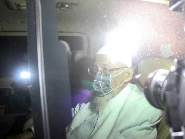 Abu Bakar Bashir, the radical Muslim cleric and alleged mastermind of the 2002 Bali bombings, is seen inside a car as he is released after was jailed for 15 years, at Gunung Sindur prison in Bogor, West Java. Picture: Reuters