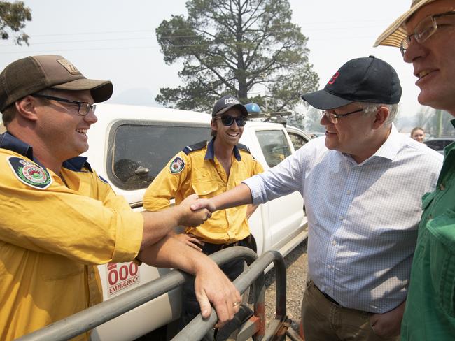 Prime Minister Scott Morrison meets volunteers at Ilford/Running Stream RFS fire shed. Picture: AAP