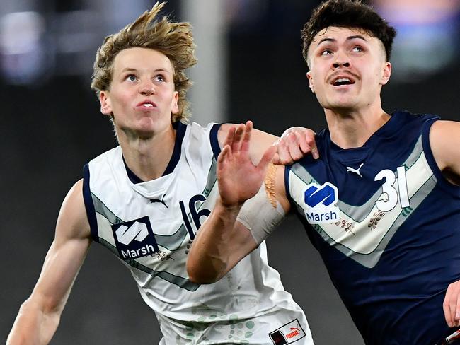 MELBOURNE, AUSTRALIA - JULY 14: Lachie Jaques of Victoria Country and Keighton Matofai-Forbes of Victoria Metro compete for a mark during the 2024 Marsh AFL Championships U18 Boys match between Victoria Metro and Victoria Country at Marvel Stadium on July 14, 2024 in Melbourne, Australia. (Photo by Josh Chadwick/AFL Photos)